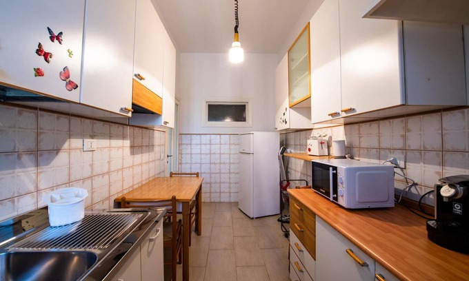 Flaminio Apartment | Piazza Carracci in Roma