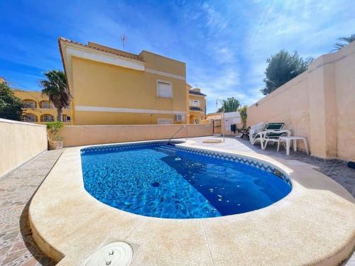 Orihuela Costa House | Pleasant 4 Bedroom Townhouse with Com Pool VM7