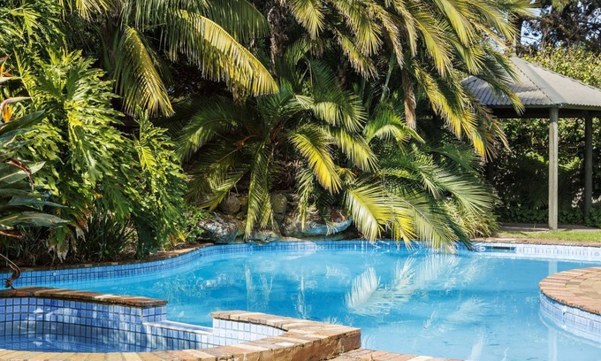Rosebud House | Poolside Palms Oasis