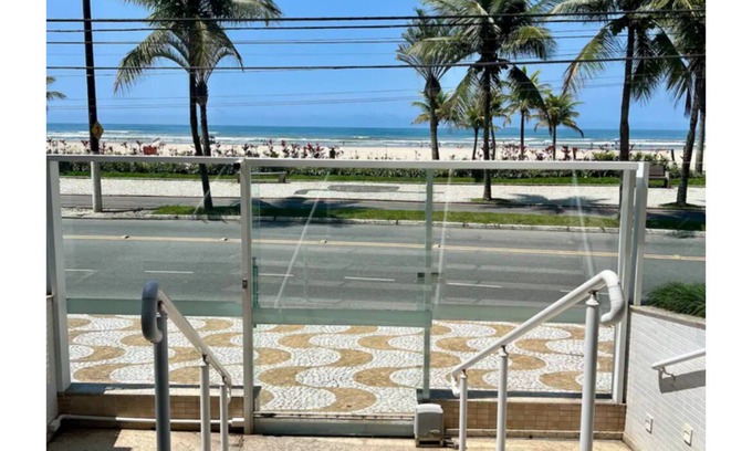 Praia Grande Apartment | Praia Grande Paradise! Feet in the sand! Facing the Sea.