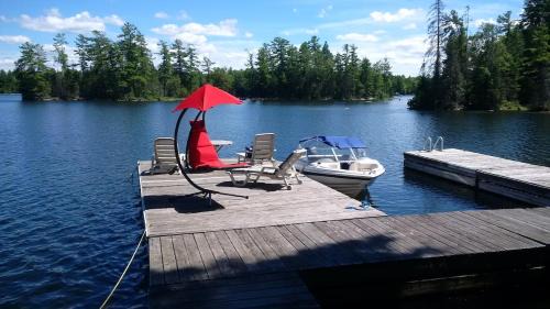 Trent Lakes Ski Chalet | Private Lakefront Family Cottage with Tennis Court