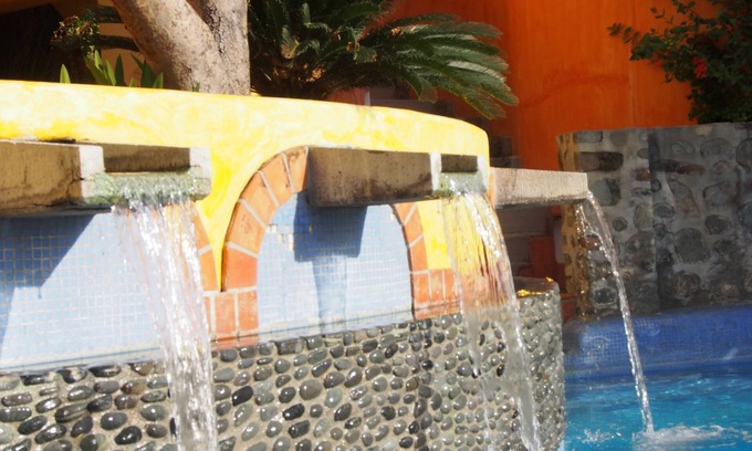 La Cruz de Huanacaxtle Villa | Private Double Bed Guest Room with Shower Bath, mini bar area and personal patio