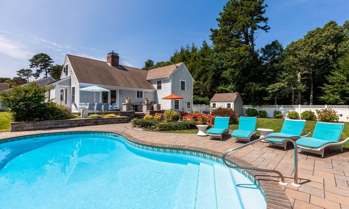 Brewster House | Private Vacation Oasis with Pool, Outdoor Kitchen & Koi Pond!