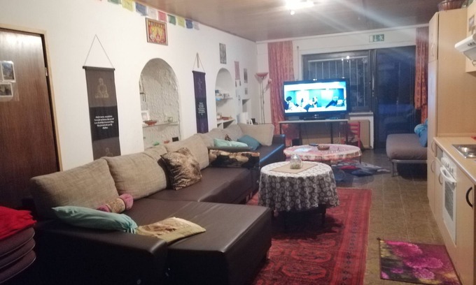 Schafhof House | Quiet basement apartment courtyard sauna mini gym & table football