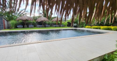 Ambondrona Apartment | RésidenceSuisse Rez de jardin
