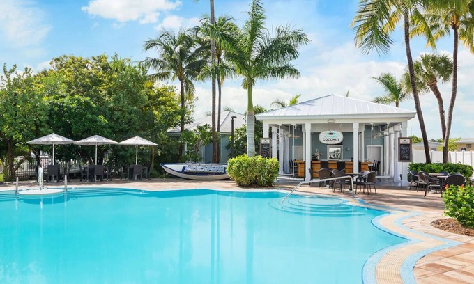 New Town Hotel | Relax & Play in Key West | Shuttle, Lawn Games & Poolside Dining