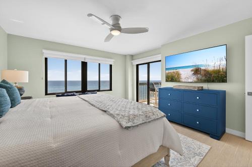 Ormond-by-the-Sea House | Renovated direct oceanfront condo with spacious balcony, heated pool, and garage parking