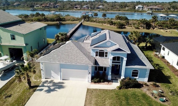 Painters Hill House | Resort-Style Living:Beautiful Beach Home with heated saltwater pool and hot tub