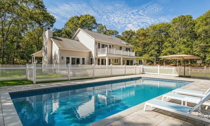 Southampton House | Resort-style Southampton retreat with heated pool, chic interiors, and.