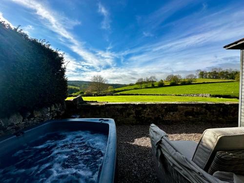 Alport House | Romantic four poster Cottage private outdoor Hot Tub & Sauna at Harthill Hall plus private daily use of indoor pool and sauna 1 hour per day