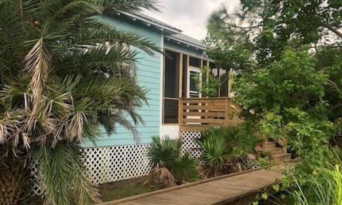 Fort Morgan Cottage | Rookery 3402 Cottage Minutes Away from Beach and the Gulf by RedAwning