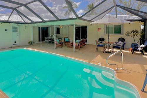 Caloosahatchee House | Saltwater Pool and Dog Friendly The Cape Escape