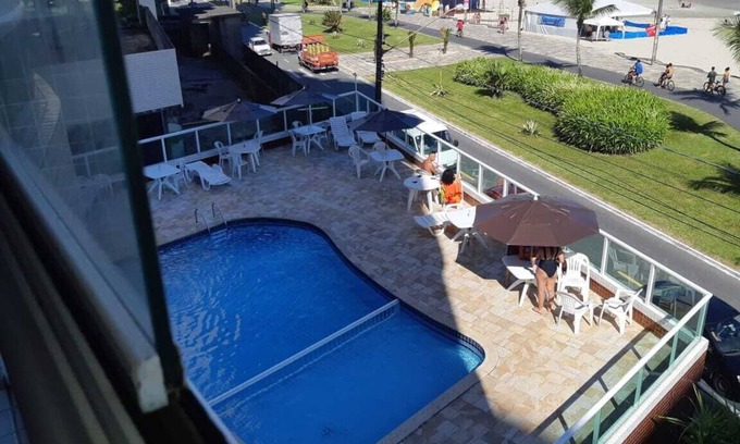 Praia Grande Apartment | SEA FRONT SWIMMING POOL BARBECUE WIFI INTERNET GAMES ROOM GARAGE CONCIERGE 24H