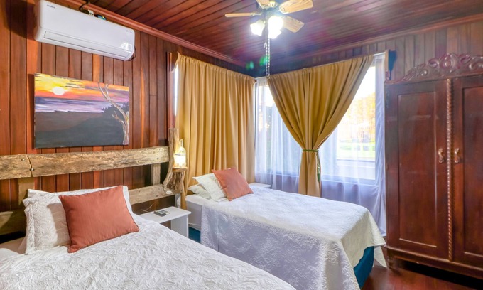 La Cruz House | Sea-view escape in family hotel with amazing views, fast WiFi, & dining on-site