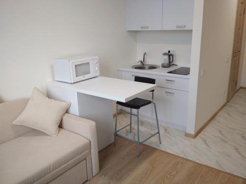 Solomjanskyj Apartment | SMART-HOUSE Smart-kvartira s kukhnei.