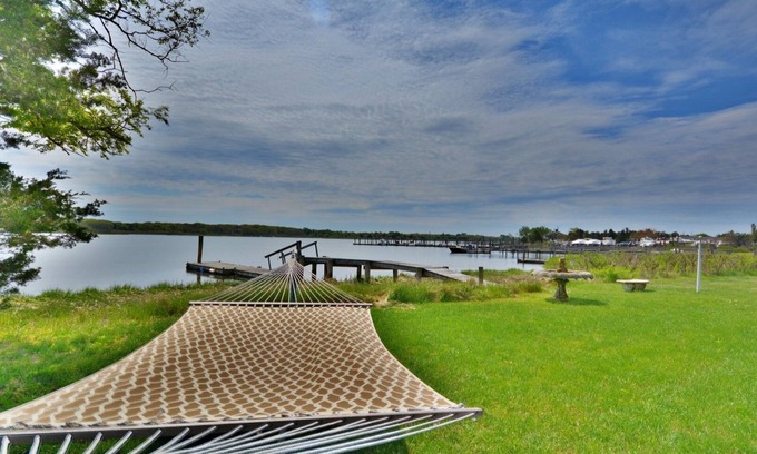 Shinnecock Hills House | Southampton WaterFront Cottage with Dock & Heated Pool