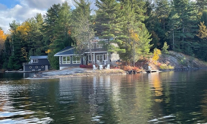 Gravenhurst Cottage | Spectacular View of Lake Muskoka with Guest Cottage above Boathouse