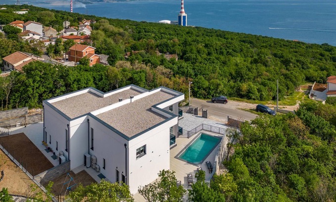 Kostrena House | Spend an unforgettable vacation in this inviting and modern vacation home with pool.