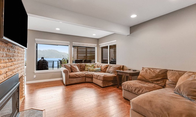 Olympia House | Sprawling lakefront property with kayaks, large deck, game table, & fireplace