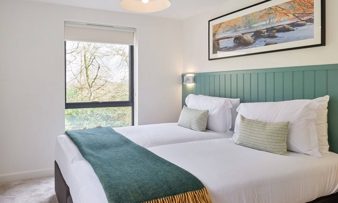 Chittlehamholt Cabin | Spread across two floors, this inviting 2-bedroom lodge promises a comfortable retreat for up to 4 g