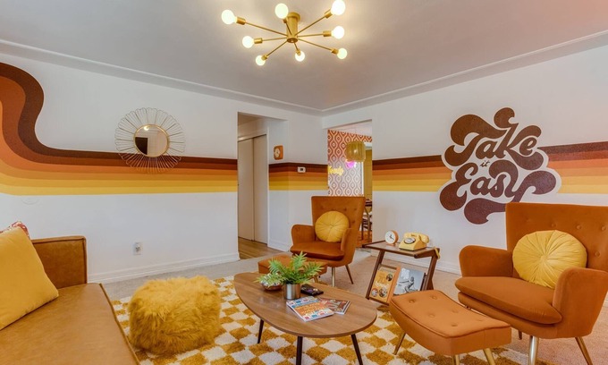 Arvada Plaza Area House | Stay Groovy in Denver | Turf Yard | 5 King Beds