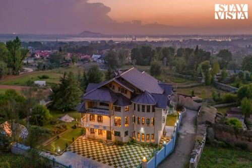 Srinagar Villa | StayVista at Lakeside Panorama with Lawn & Wi-Fi