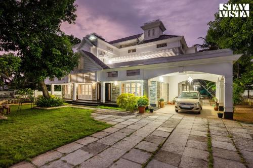 North Paravur Villa | StayVista at Orchid Haven with BBQ, Pool