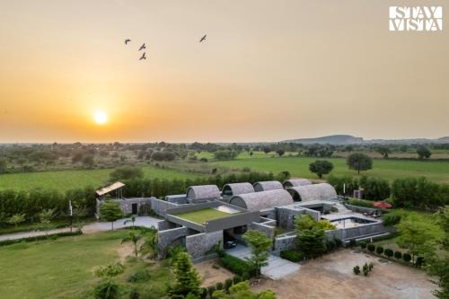 Rajawas Villa | StayVista at The Stone Age Home with Pool, Lawn, BBQ & Bonfire
