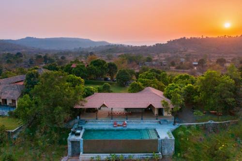 Mangaon Khurd Villa | StayVista's Basalt - with Mountain Views, Infinity Pool, Vintage Interiors, and Games Room