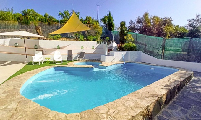 Cabra Villa | Stunning private villa with A/C, WIFI, hot tub, private pool, TV, terrace and pets allowed