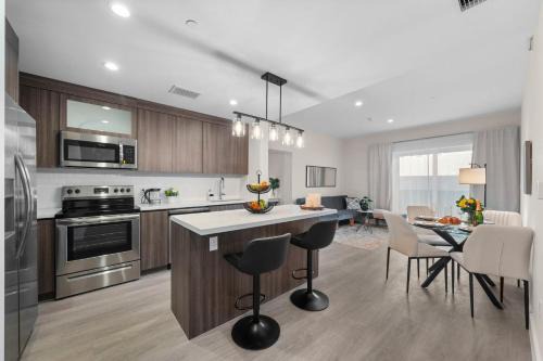Parkside Apartment | Stylish Condo, Walk to Dining, 5 Min to Beach
