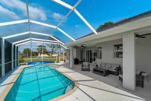 Long Meadow House | Sun-Soaked & Tranquil Getaway Relaxing Pool Area