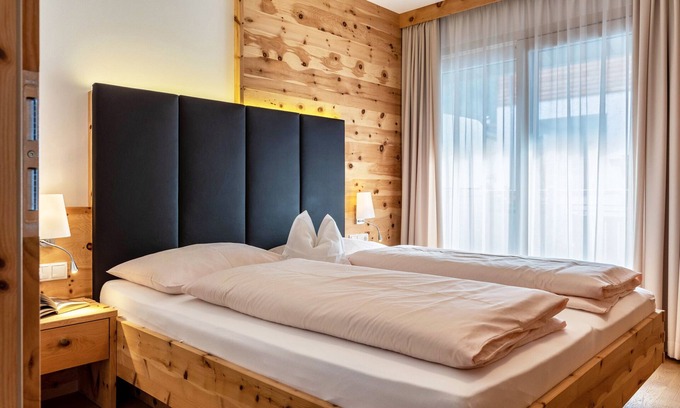 Gudon Apartment | Superior Holiday Apartment 'Marialisa Apt Orchidee' with Mountain View, Whirlpool & Wi-Fi