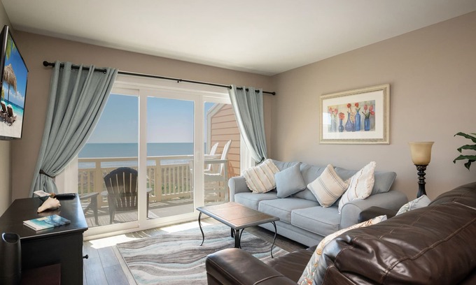 Caswell Beach Condo | Swept Away: Modern Oceanfront Condo Steps from Community Pool