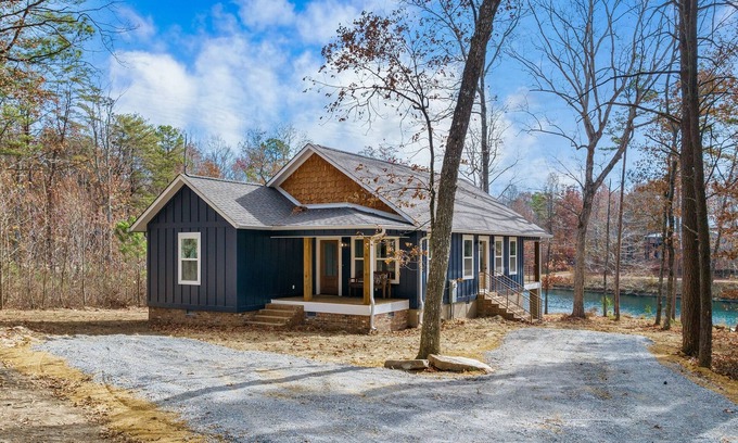 Mentone House | The Away Place-hot tub & fireplace on the lake