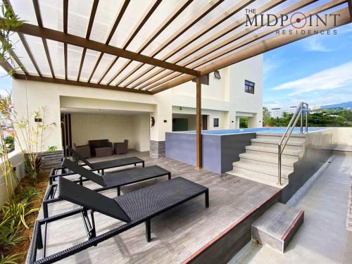 Mandaue Apartment | The MIDPOINT Residences 2 bedroom for couple or family condo near Ayala Center Cebu and SM City Cebu