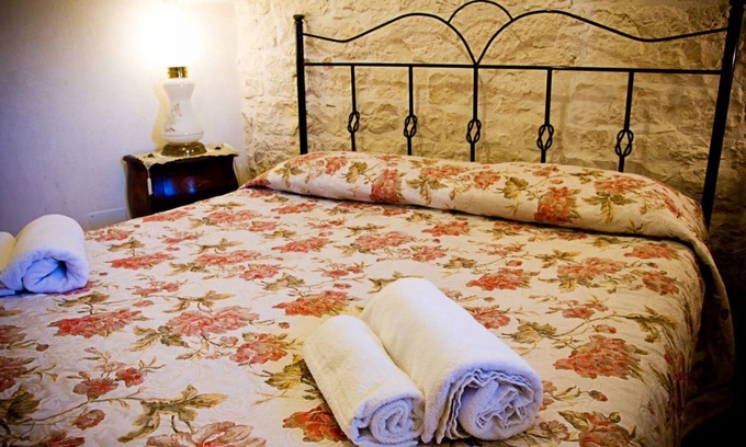 Martina Franca House | The Panoramic: 1800s trullo house with vineyard and Itria Valley views