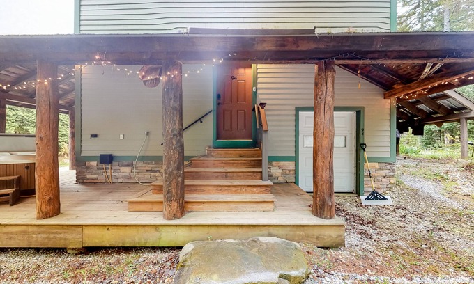 Mount Holly Apartment | Three-level dog-friendly getaway with a private hot tub, fireplace, & W/D