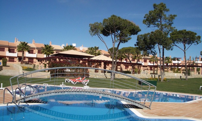 Quarteira House | Townhouse Overlooking Pool and Gardens and facing Pestana Vila Sol Hotel.