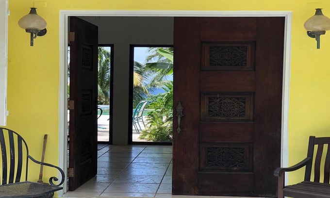 Estate La Vallee House | Tropical getaway with Ocean View and pool perfect for relaxing family retreats.