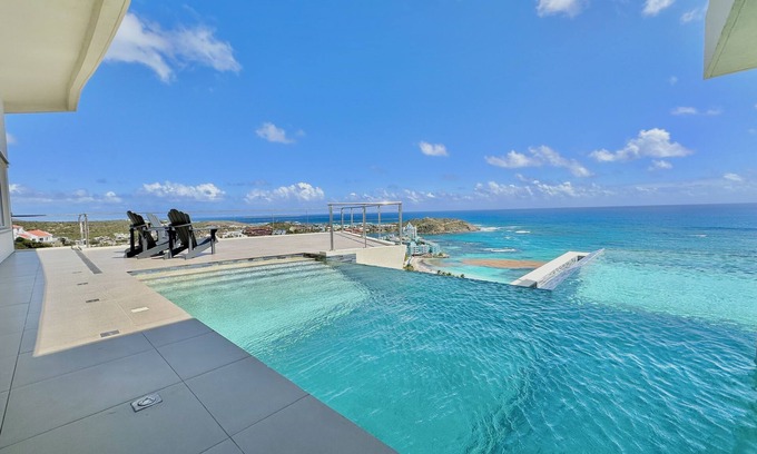 Oyster Pond Villa | Tropical modern villa with stunning sea views