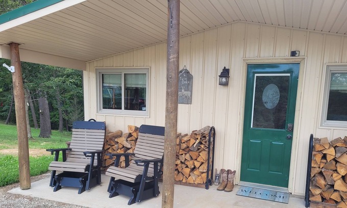 Kerr Cabin | Twin Oaks is a rustic and pet friendly cabin located on 50 mostly wooded acres