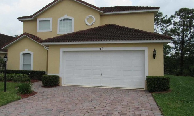 Lake Wilson Preserve House | Two story, spacious 4/3 Pool Home at Lake Wilson Preserve. Backed to a conservation area for enhance