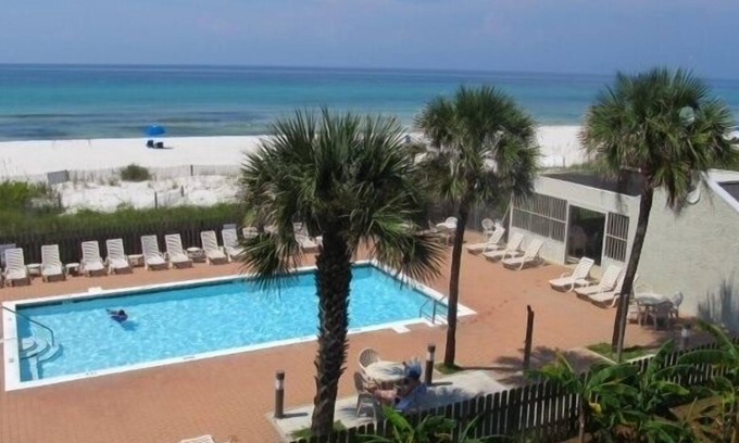 Sunnyside Condo | Updated, spacious Gulf-front Condo- just steps to the beach!