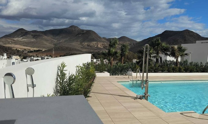 San Jose Ski Chalet | Urbanization with swimming pool and gym. BBQ and private solarium. Panoramic views.
