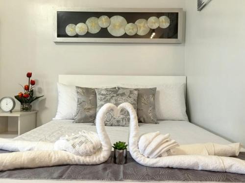 Puerto Princesa City Centre Apartment | Verdant Resort Condo with Pool, Balcony, Near Airport and Beach