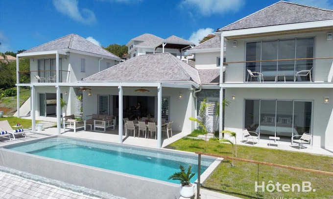 Tartane Villa | Villa Jamming 5* – Tropical Luxury, Infinity Pool & Private Dock