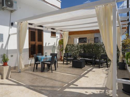 Torre Ovo House | Villa Nina - Spiaggia Vicina, Patio esterno, AC