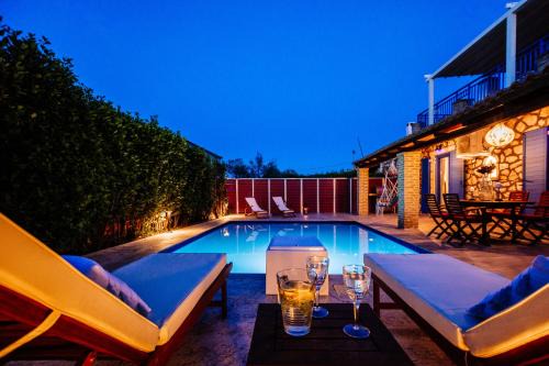 Psarou Villa | Villa Rosemarie - Luxurious Villa with Pool Just Steps Away from the Sea By Villa Mana Gers