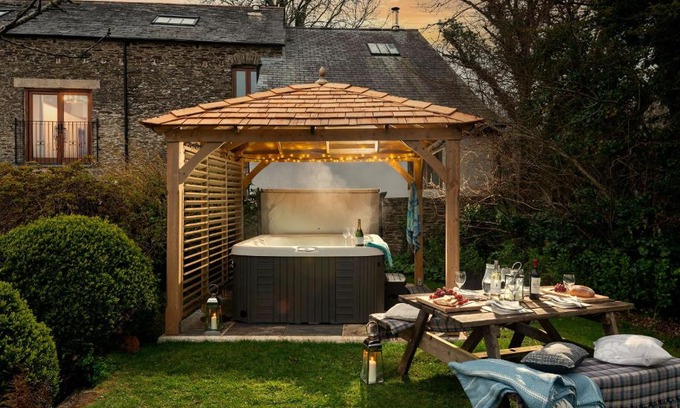 Widegates House | Water Mill at East Trenean Farm -Luxury Cornish Cottage sleeping 4 with hot tub, private garden, rural views and EV facilities